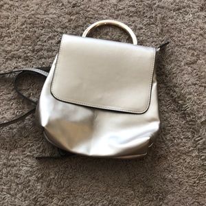 Goldish tone backpack